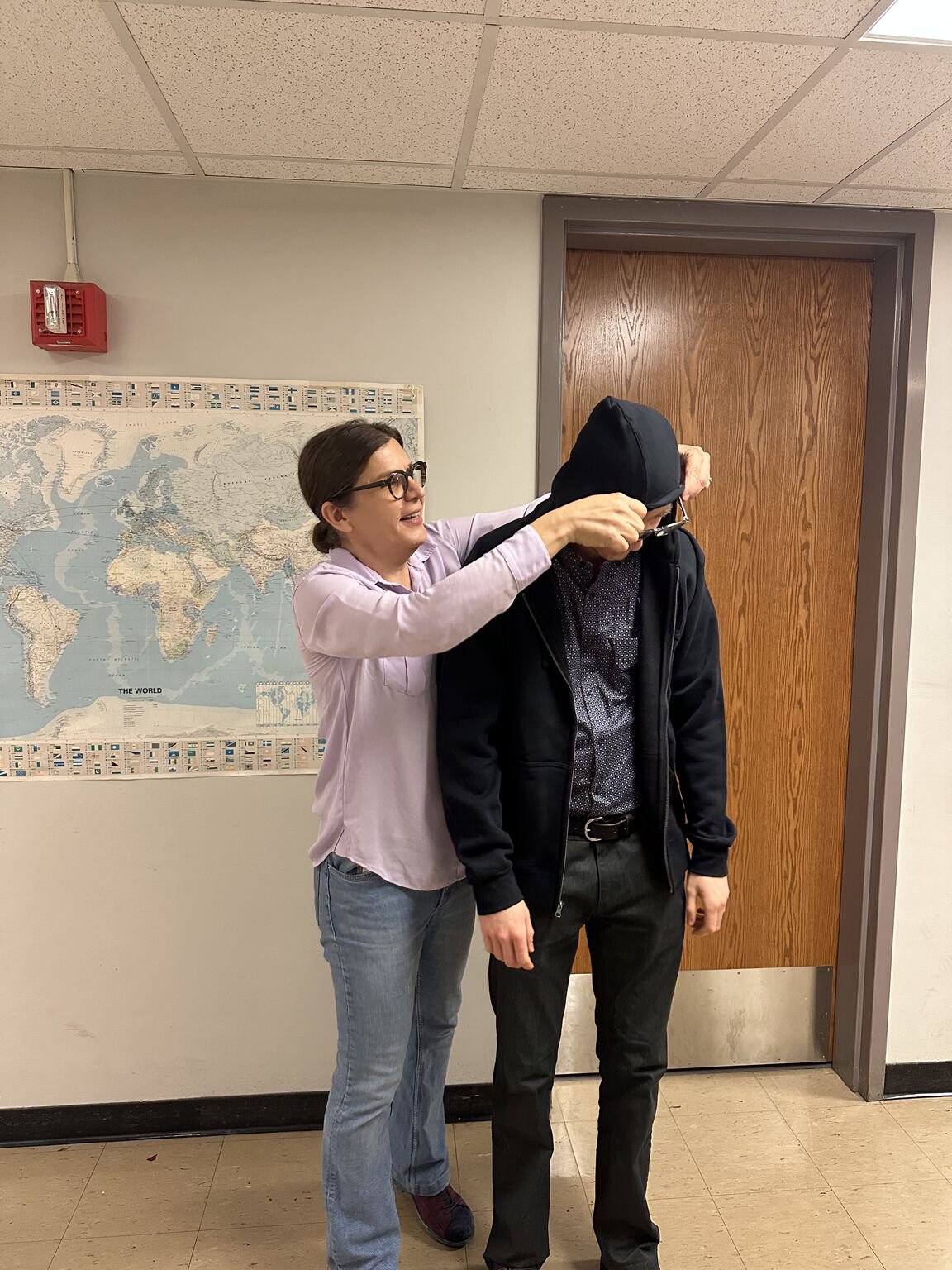 The traditional Pozzo-group hoodie ceremony