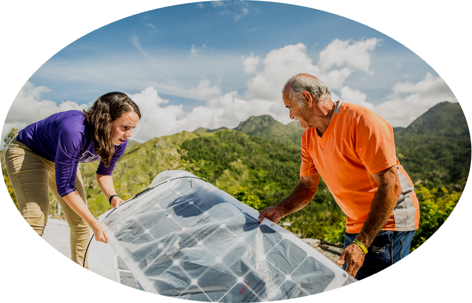 Installing solar panels in Jayuya, Puerto Rico